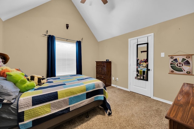 carpeted bedroom featuring vaulted ceiling and ceiling fan