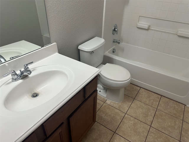 full bathroom featuring tub / shower combination, vanity, toilet, and tile patterned floors