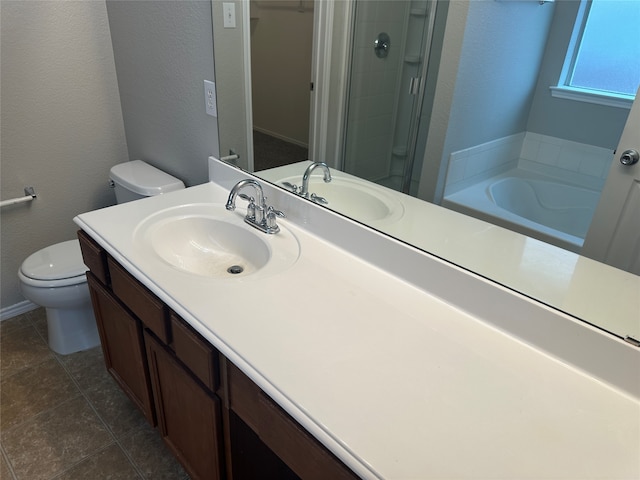 full bathroom featuring plus walk in shower, tile patterned flooring, vanity, and toilet