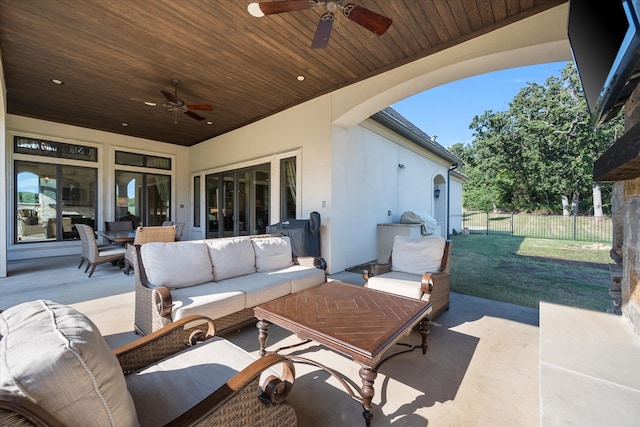 view of patio with ceiling fan and an outdoor hangout area