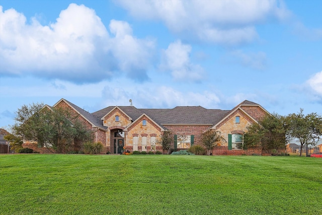 view of front of home with a front lawn