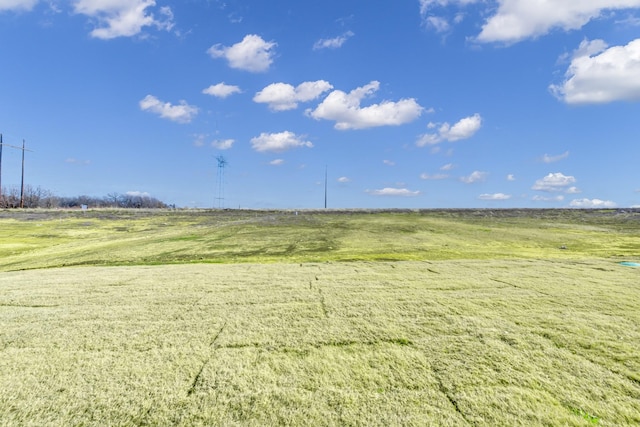 exterior space with a rural view