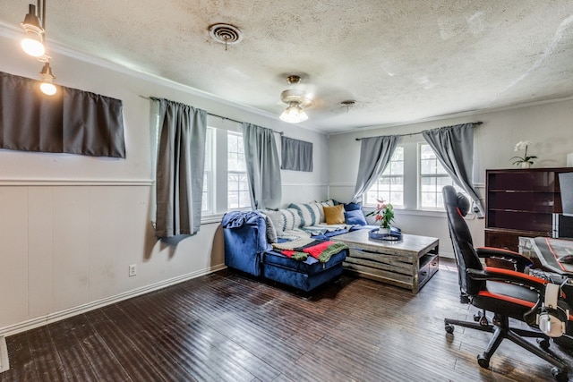 office space featuring ceiling fan, dark hardwood / wood-style flooring, and a wealth of natural light