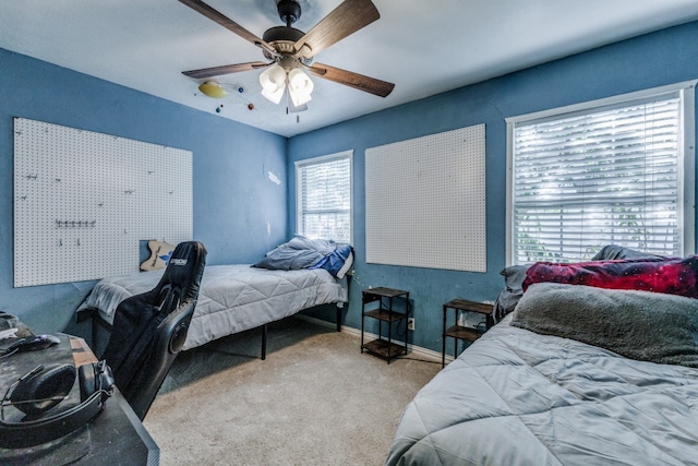 bedroom with carpet floors and ceiling fan