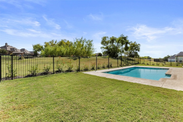 view of pool with a lawn