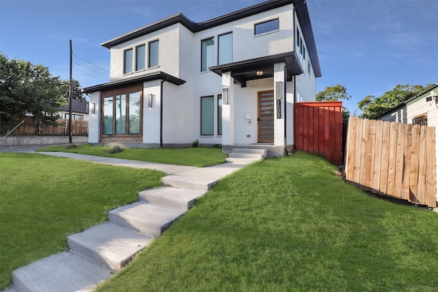 contemporary house with a front lawn