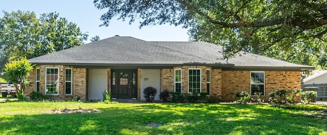 single story home with a front yard