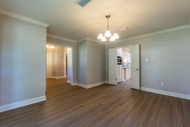 unfurnished dining area with a notable chandelier, crown molding, and dark wood-type flooring