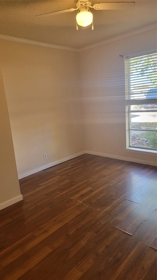 unfurnished room featuring a textured ceiling, ceiling fan, dark hardwood / wood-style floors, and crown molding