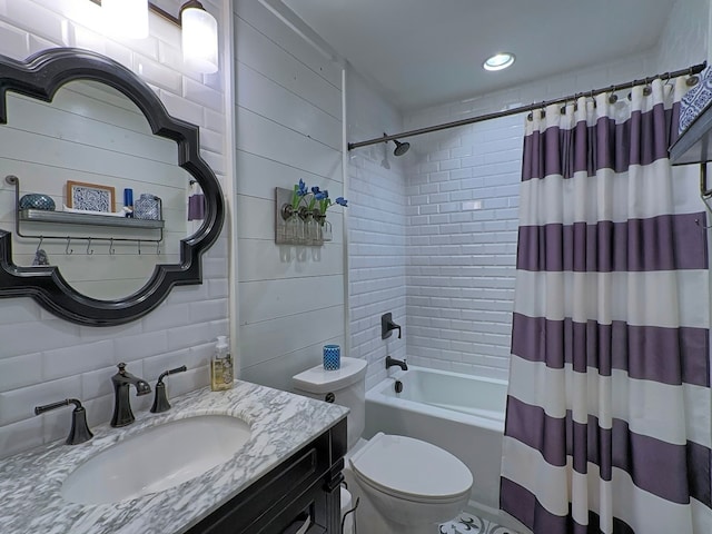 full bathroom featuring backsplash, shower / bath combo, vanity, and toilet