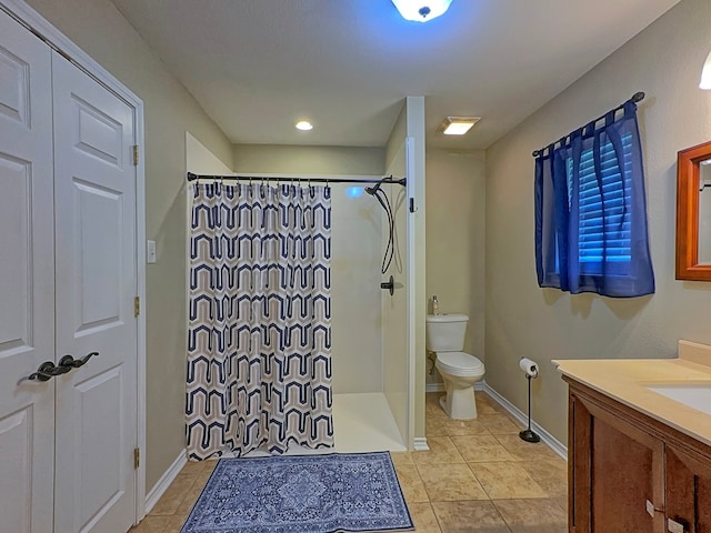 bathroom with vanity, tile patterned floors, toilet, and a shower with shower curtain