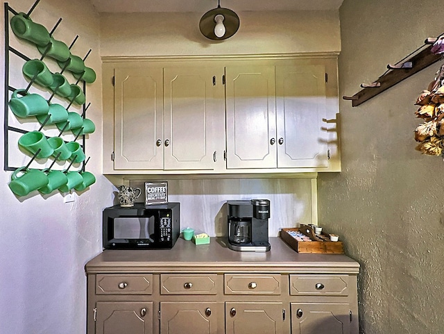 kitchen with white cabinets