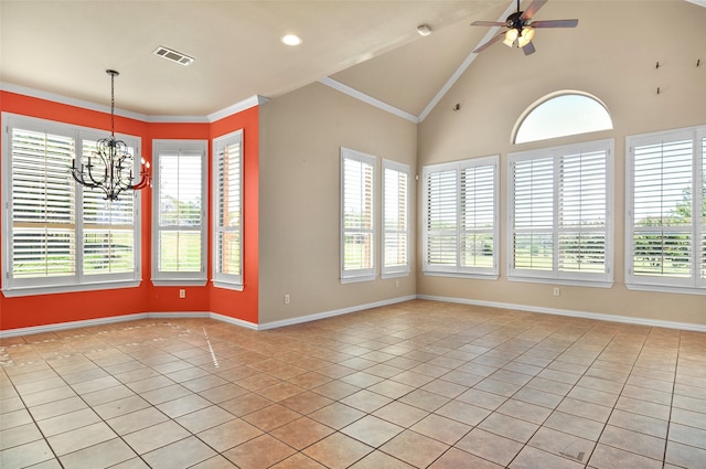 empty room featuring ceiling fan with notable chandelier, crown molding, and light tile patterned floors