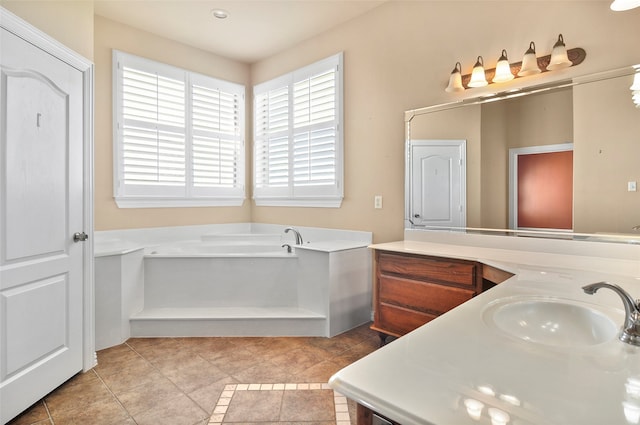 bathroom featuring vanity, tile patterned flooring, and a tub