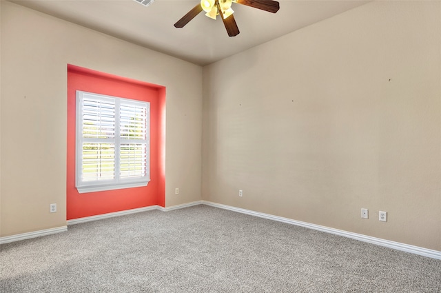 carpeted empty room with ceiling fan