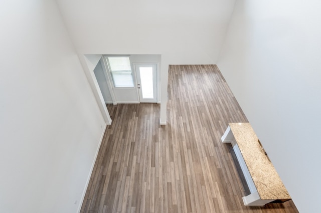 unfurnished living room featuring light wood-type flooring