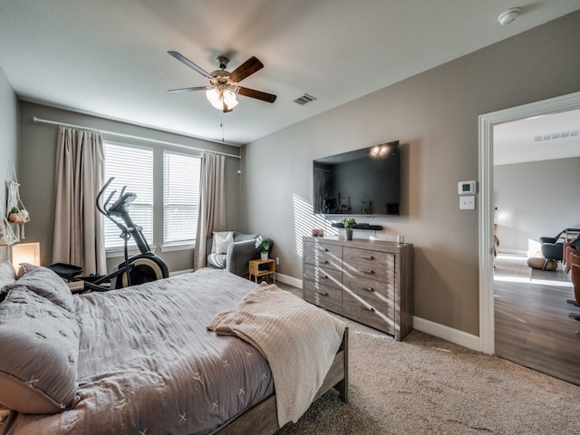 carpeted bedroom featuring ceiling fan