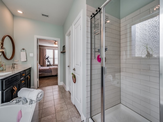 bathroom with independent shower and bath, tile patterned flooring, vanity, and ceiling fan