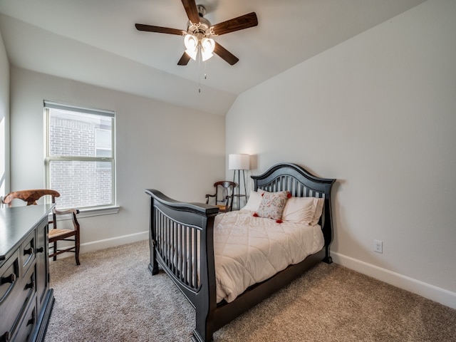 bedroom with light carpet, vaulted ceiling, and ceiling fan