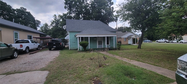 bungalow with a front lawn