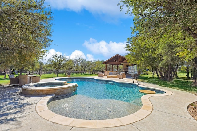 view of pool with a patio area, a lawn, a gazebo, and an in ground hot tub