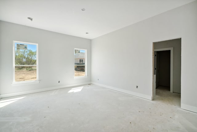 unfurnished room with plenty of natural light