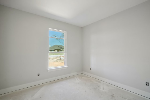 unfurnished room featuring plenty of natural light