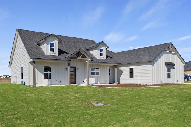 view of front of property with a front lawn