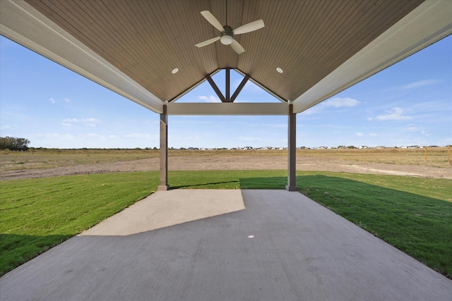 view of patio / terrace with a rural view and ceiling fan