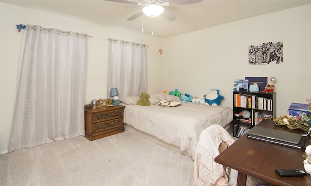 bedroom with ceiling fan and carpet flooring