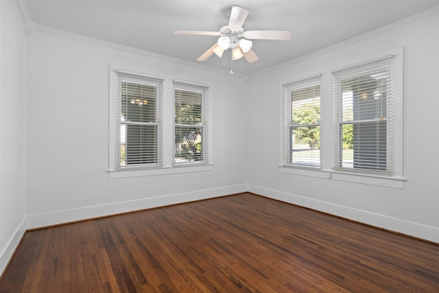 empty room with ceiling fan, dark hardwood / wood-style floors, ornamental molding, and a healthy amount of sunlight