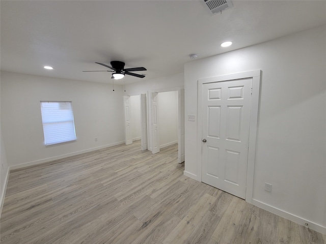 interior space featuring light wood-type flooring and ceiling fan