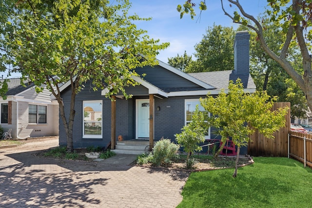 view of front of house with a front lawn