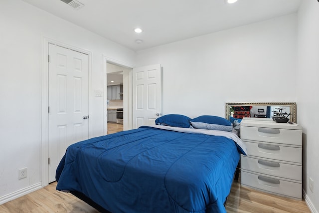 bedroom featuring light hardwood / wood-style flooring