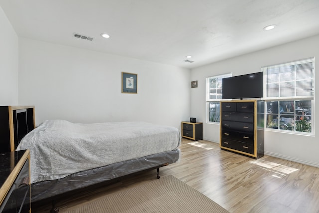 bedroom featuring wood-type flooring