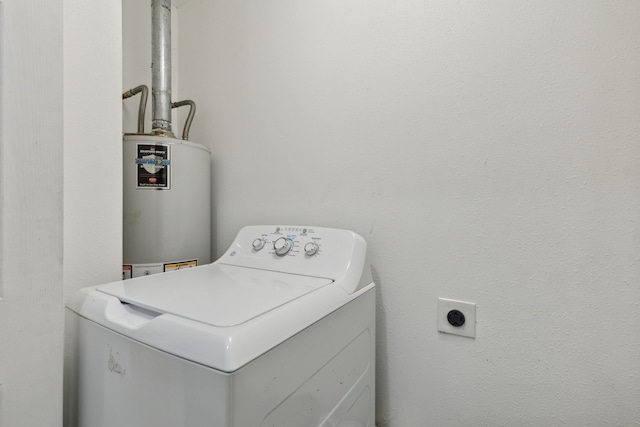 washroom with washer / dryer and gas water heater