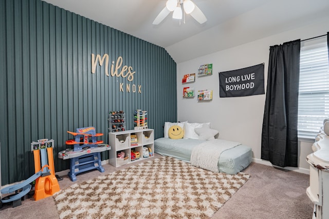 bedroom with lofted ceiling, ceiling fan, and carpet floors