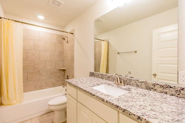 full bathroom featuring shower / bathtub combination with curtain, tile patterned floors, vanity, and toilet