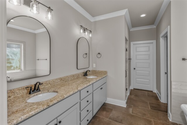 bathroom with vanity and ornamental molding