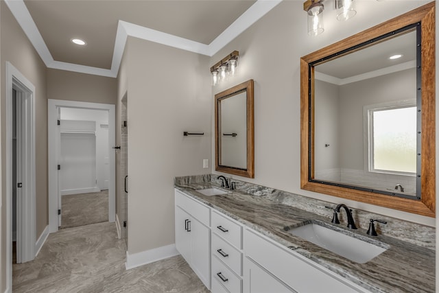 bathroom featuring vanity and crown molding