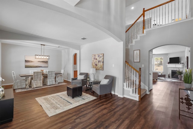 living room with dark wood-type flooring