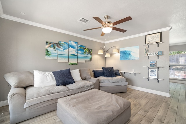 living room with ceiling fan, a textured ceiling, light wood-type flooring, and crown molding