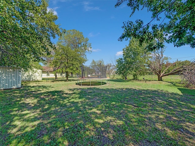 view of yard featuring a trampoline