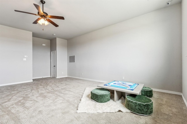 interior space featuring ceiling fan