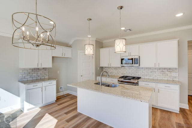 kitchen featuring sink, white cabinetry, and stainless steel appliances