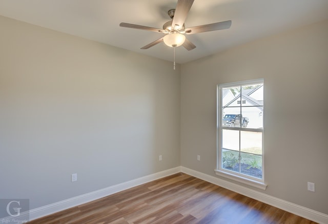 unfurnished room with ceiling fan and light hardwood / wood-style floors