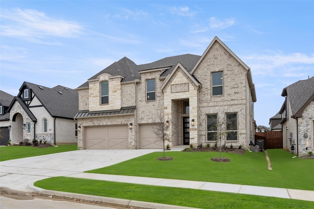 french country inspired facade featuring a garage, central air condition unit, and a front yard