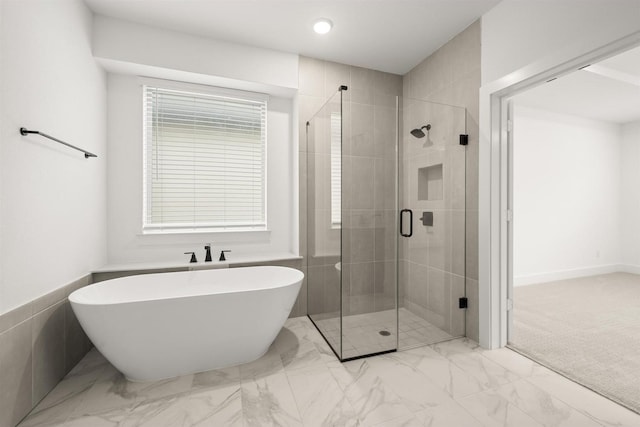 1406 Chickadee Dr, Mansfield, TX 76063 - bathroom with a freestanding bath, a stall shower, and marble look tiles