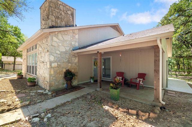 rear view of house with a patio area