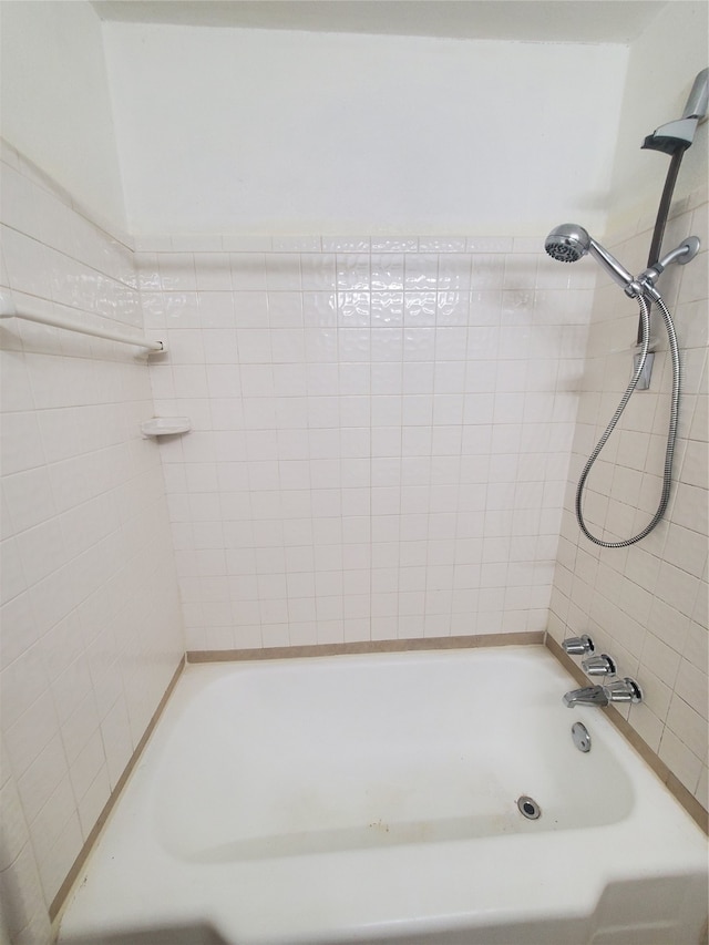 bathroom with separate shower and tub